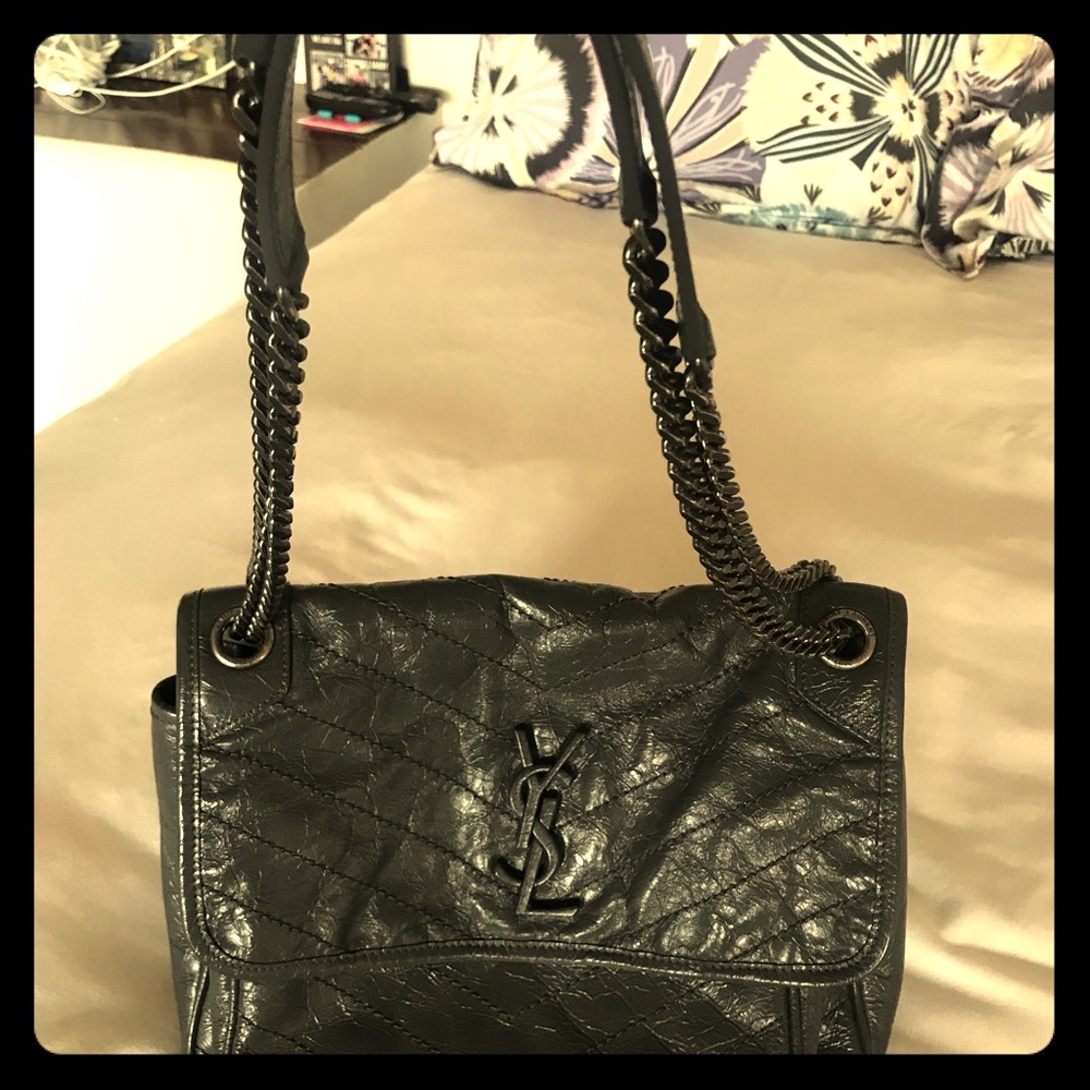 Saint Laurent gray leather bag with YSL duster